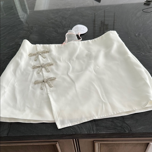 More to Come Dresses & Skirts - Elegant White Skirt with Bow Accents